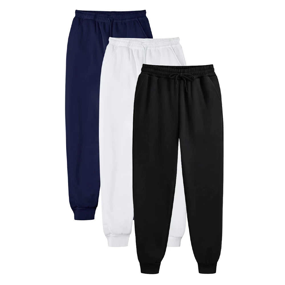 Ensemble de trois pantalons de gym homme en noir, blanc et bleu marine avec taille élastique